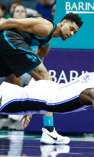 Walker, Monk lead Hornets past Magic, 125-100